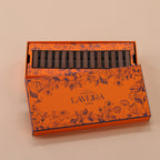 Orange box with black text and floral design on a beige background
